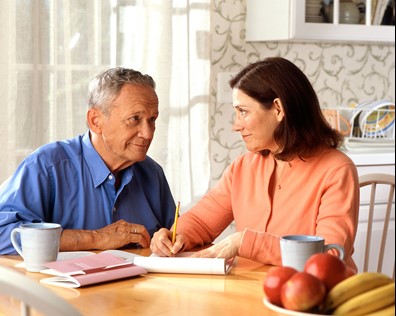17068-a-woman-and-older-man-sitting-at-a-table-pv (April Blog1).jpg
